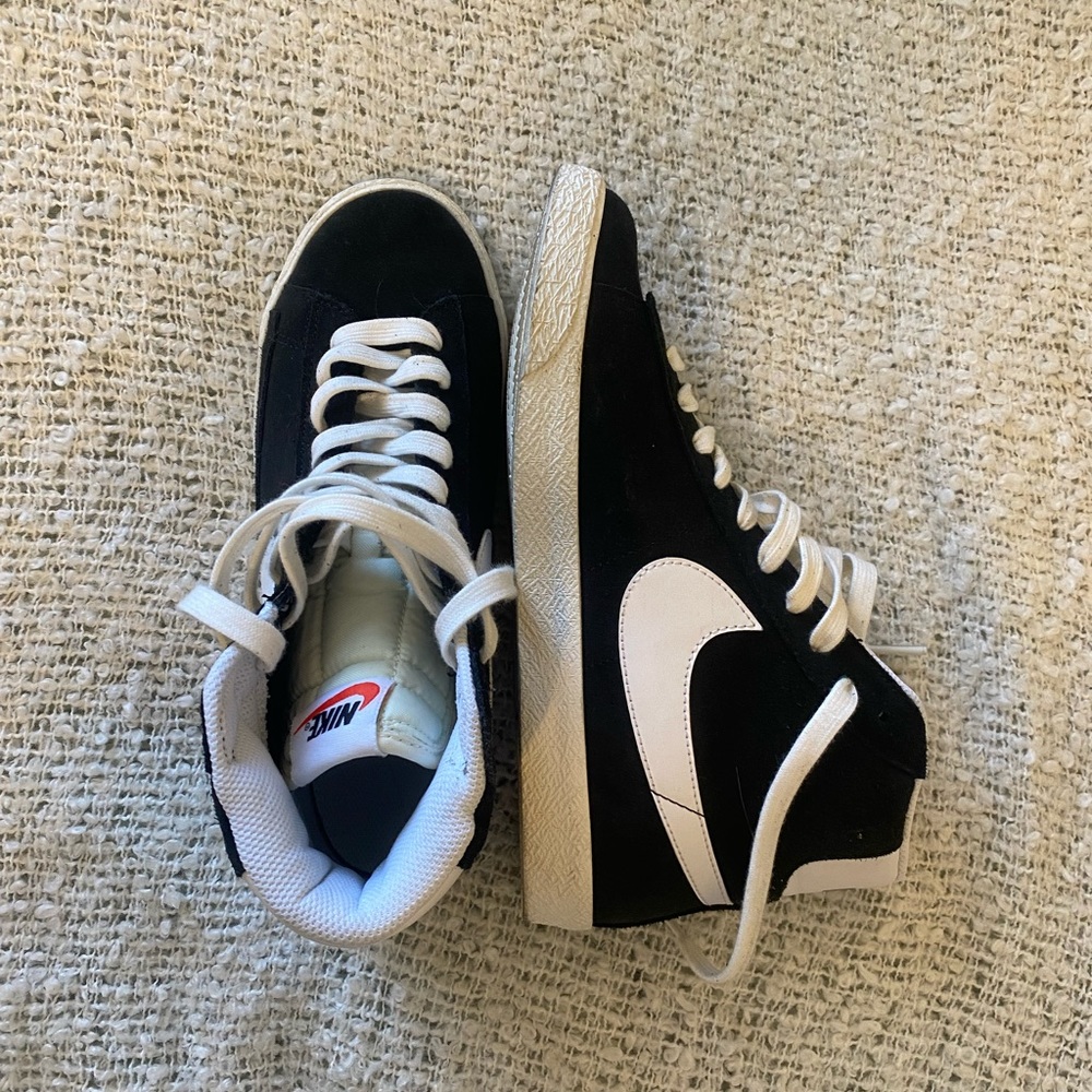 Black high top Nikes (kind of like blazers)